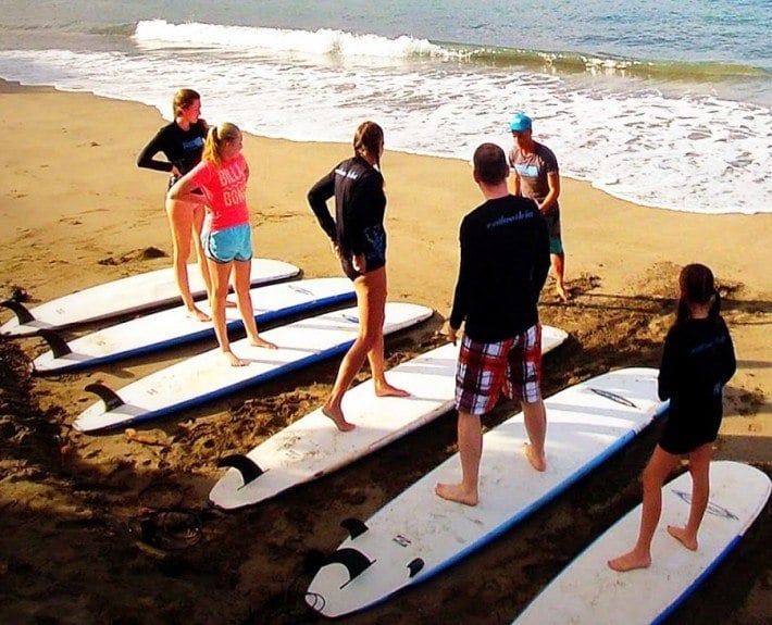 Take a surfing lesson in Maui