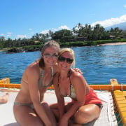 Two women on Maui sailing canoe